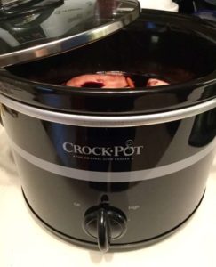 CrockPot con pere in cottura