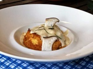 Flan di zucca al rosmarino su fonduta di Taleggio DOP