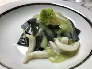 Lasagnetta al nero di seppia con crema di broccolo romanesco e seppie scottate